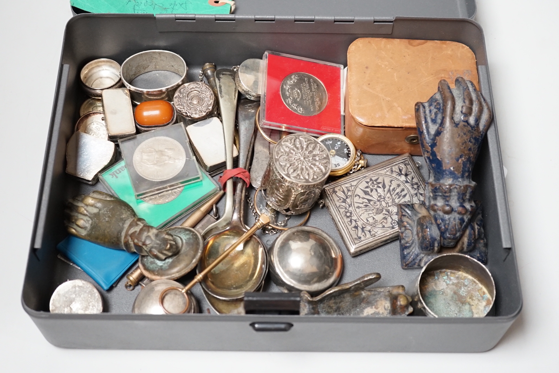 A collection of silver and white metal pill boxes, niello purse, lorgnette and assorted collectables